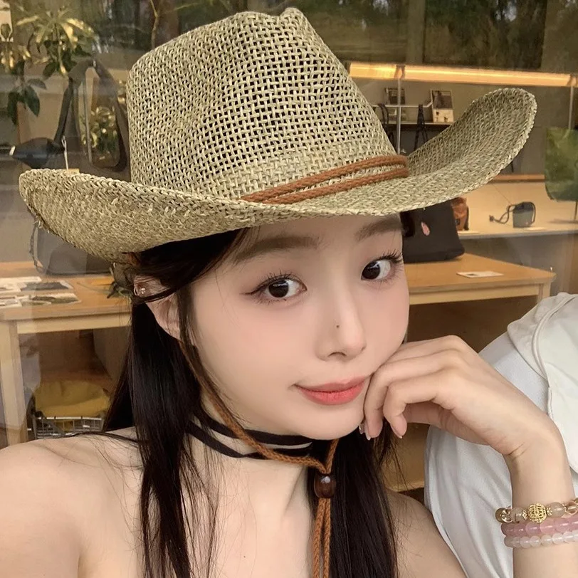 

Korean version of online celebrity straw hollow breathable cowboy hat tourism big hat female outdoor sun visor.