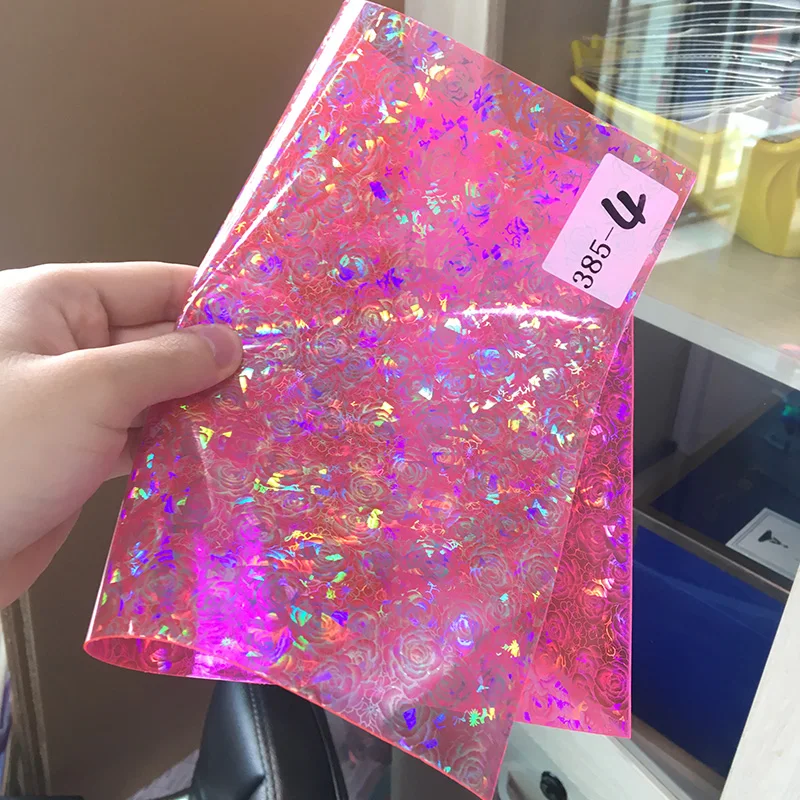 

Holographic Transparent PVC Film Vinyl Iridescent Rose Pattern Faux Leather Fabric for Bow Cover Bag DIY Craft Material 30*135CM