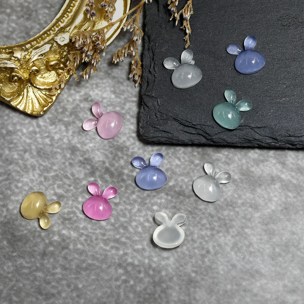

50pcs Mixed UV Light Rabbit Nail Charms Resin Kawaii Luminous Tulip Butterfly Nail Rhinestone Decorations DIY Manicure Accessory