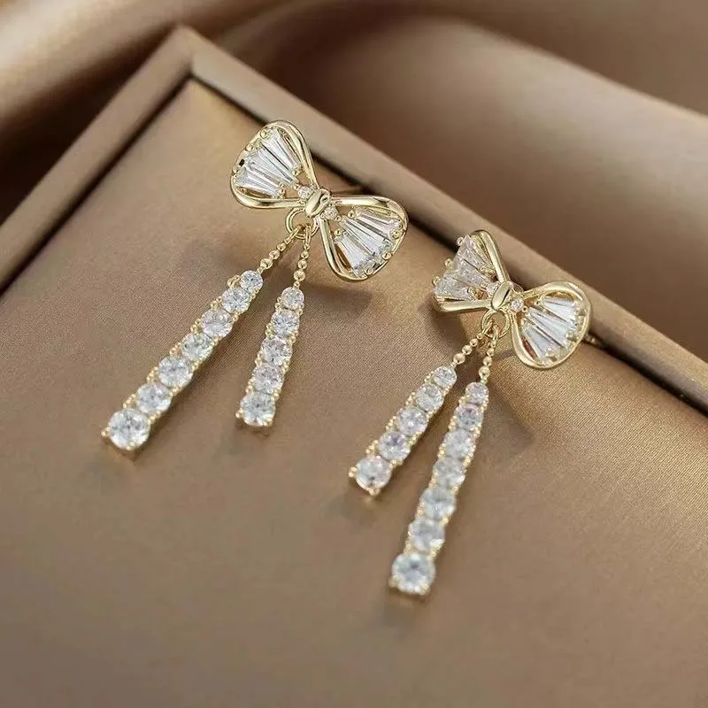 Boucles D'Oreilles Pendantes Noeud Papillon Cristal Plaqué Or Blanc - Argenté Alliage