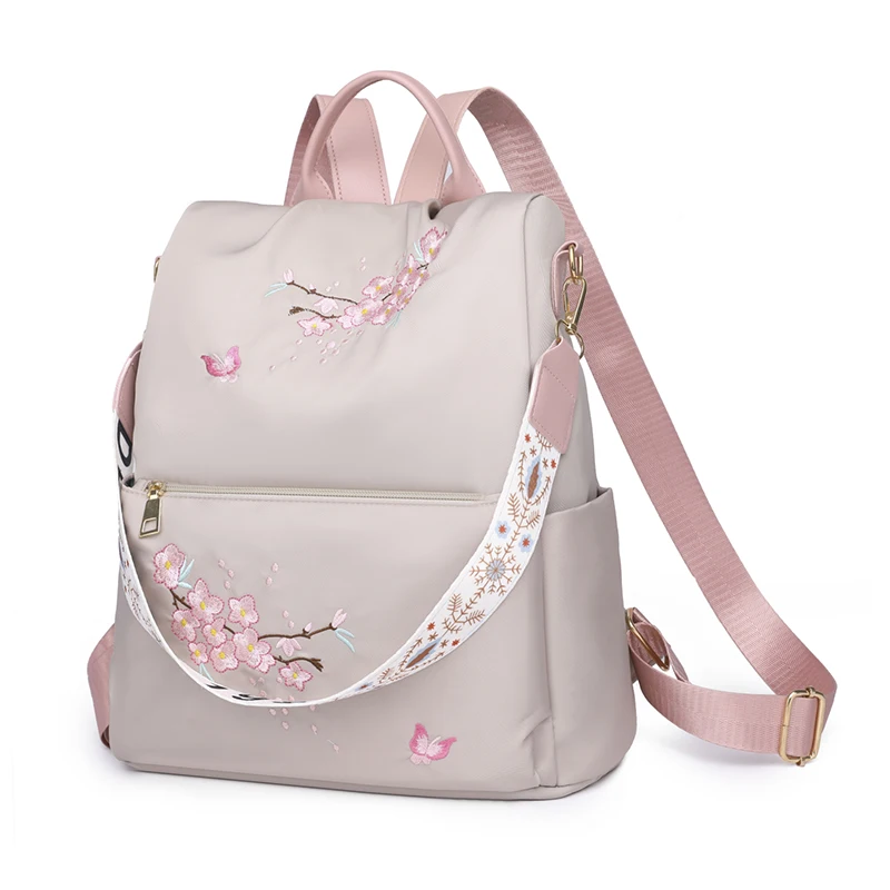 Ladies' backpack, large capacity, adjustable shoulder straps, zipper closure, casual university style, perfect for students and