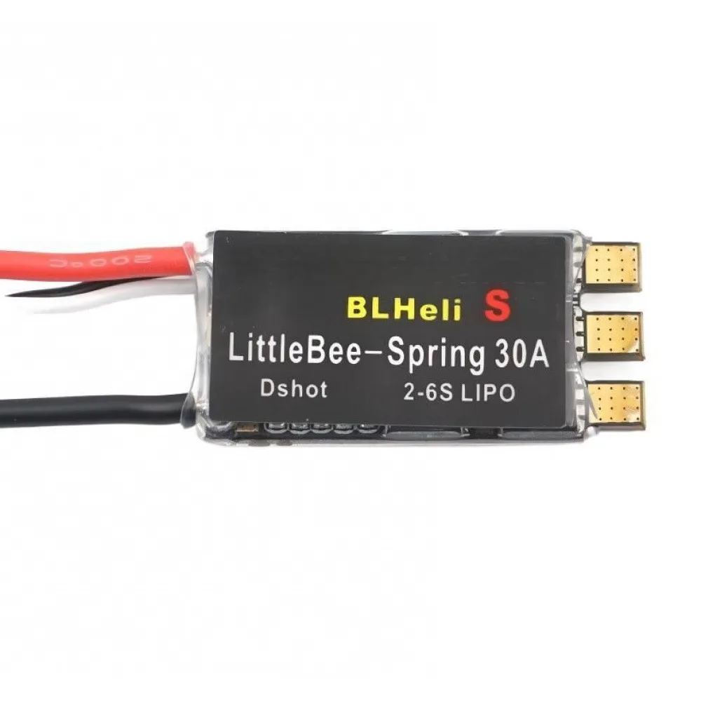 Détail du dissipateur thermique et des composants électroniques du contrôleur de vitesse 20A/30A pour drone FPV.