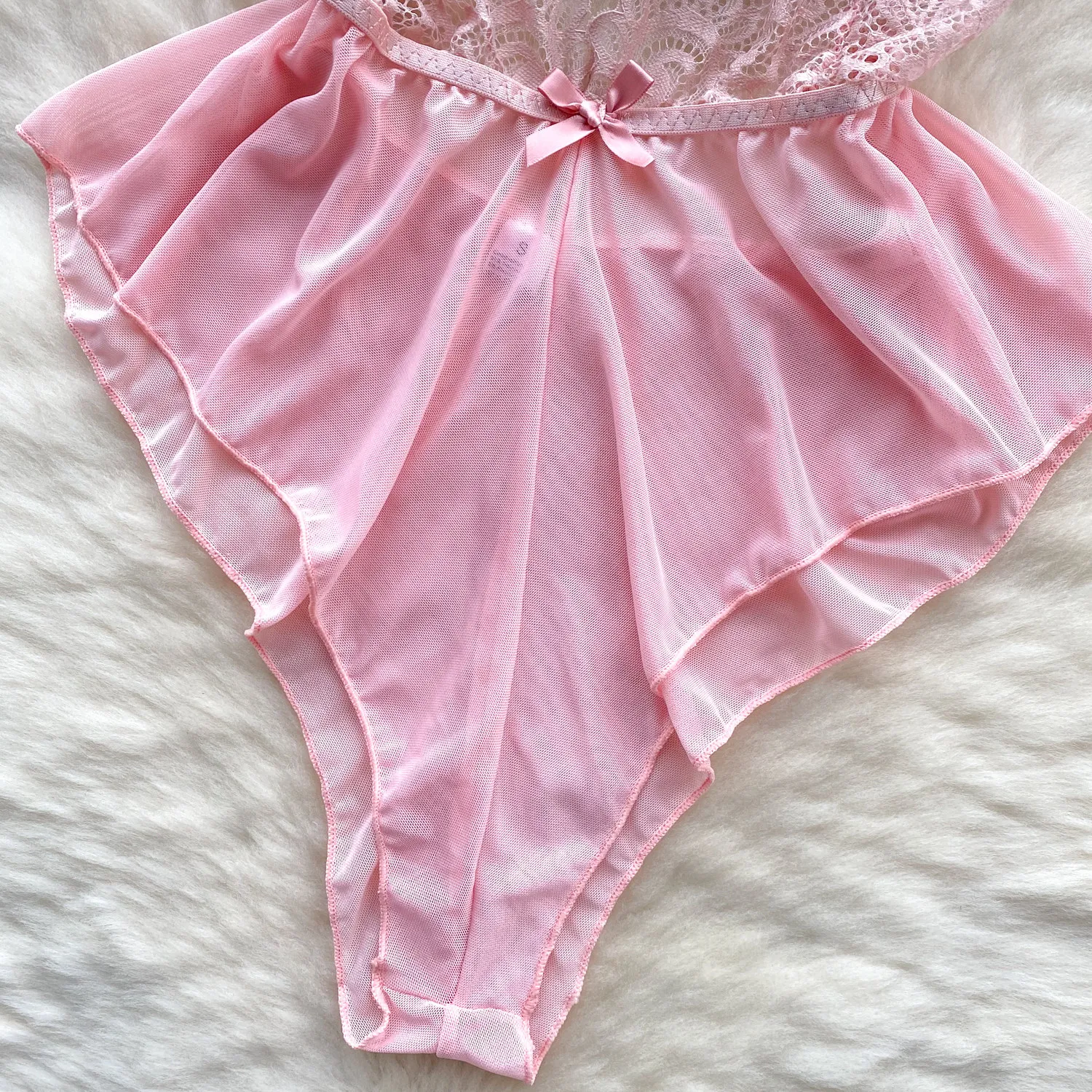 pink lace bodysuit with floral mesh upper section