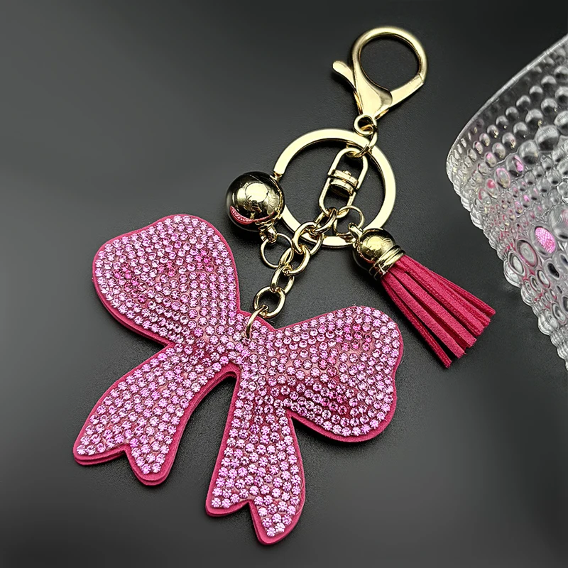 Rosa trendiger Schlüsselanhänger mit Schleife für Damen und Herren, glitzernder, vollkristallbesetzter Quasten-Schlüsselanhänger, süßer Taschenanhänger, Schmuck.
