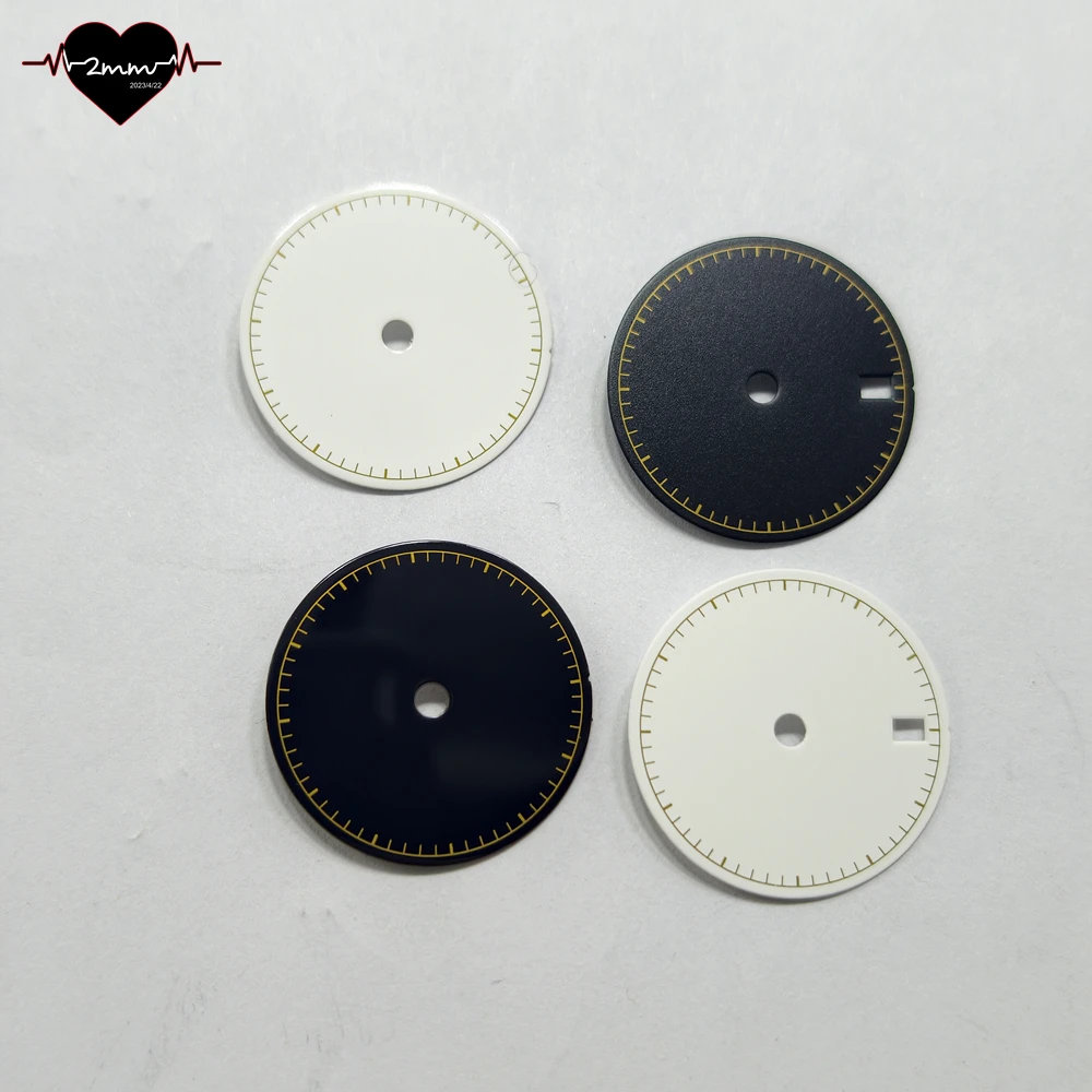 Glossy Matte Black Watch Dial with Gold Accents and Date Window