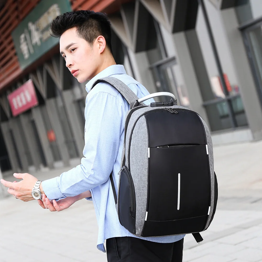 Oxford cloth backpack male USB rechargeable student schoolbag fashion business password anti-theft computer bag