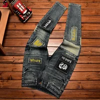 High-End Jeans Men's Autumn and Winter Fashion Ripped Patch Pu Shuai Embroidered Printed Slim Fit Skinny Stretch Pants 1