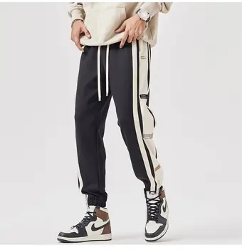 Sport uomo primavera e autunno logo design giovani pantaloni casual collocazione allentata colore bundle feet 2024 nuovi pantaloni all-matching 1