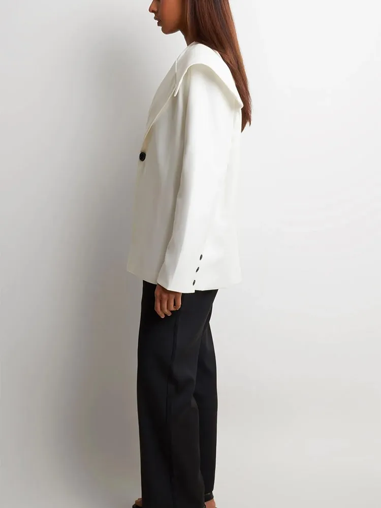 KBQ Spliced Button Loose Hollow Out Blazer For Women Notched Collar Long Sleeve Solid Temperament Blazers Female Fashion Style