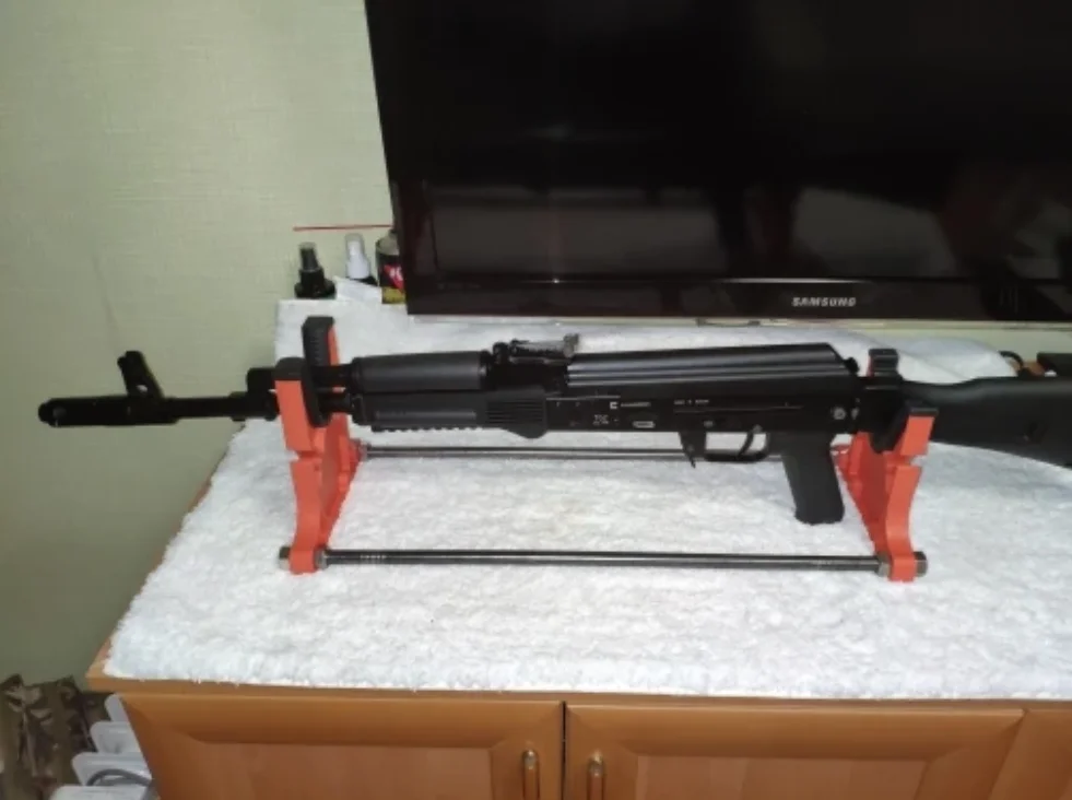  slider image of GUN REST CLEANING MAINTENANCE