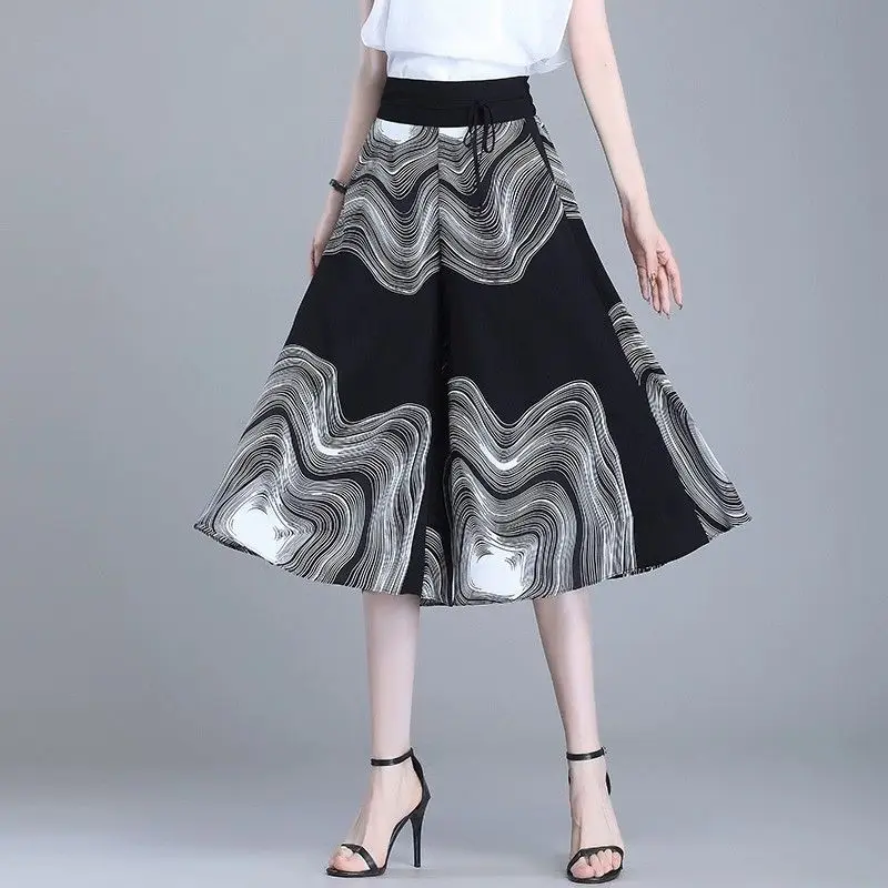 

Women 2024 Summer Fashion Printing Elastic High Waist Trousers Female Loose Seven Points Skirt Pants Ladies Wide Leg Pants N17
