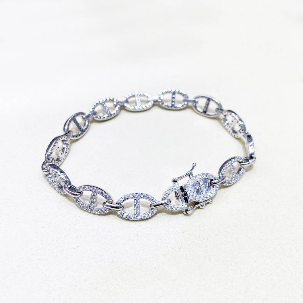 Close-up of sparkling zircon stones on tennis bracelet