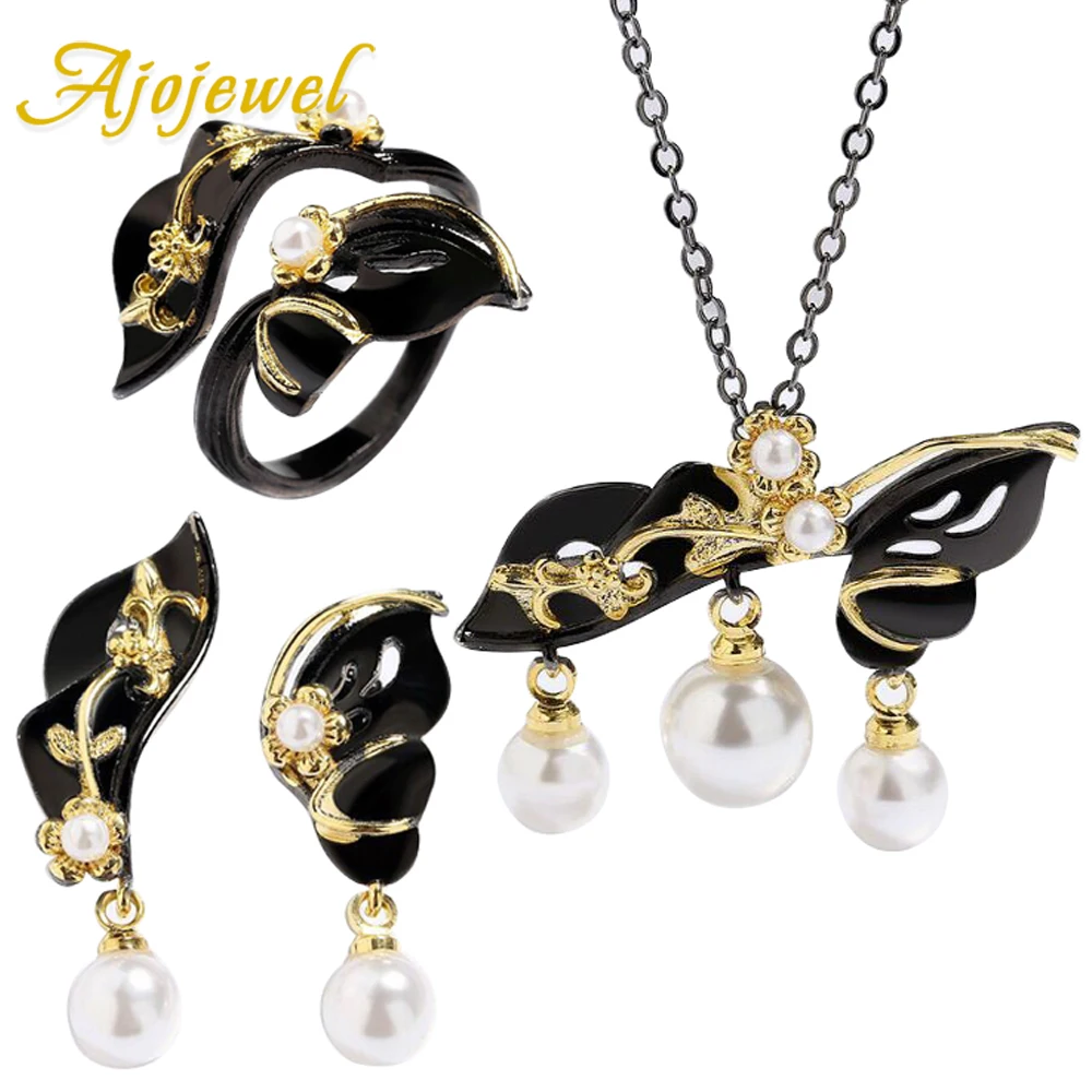 

Ajojewel 2023 New Leaf Design Black Jewelry Set For Women With Pearl Tassel Golden Flower Necklace Earrings And Ring Drop Ship