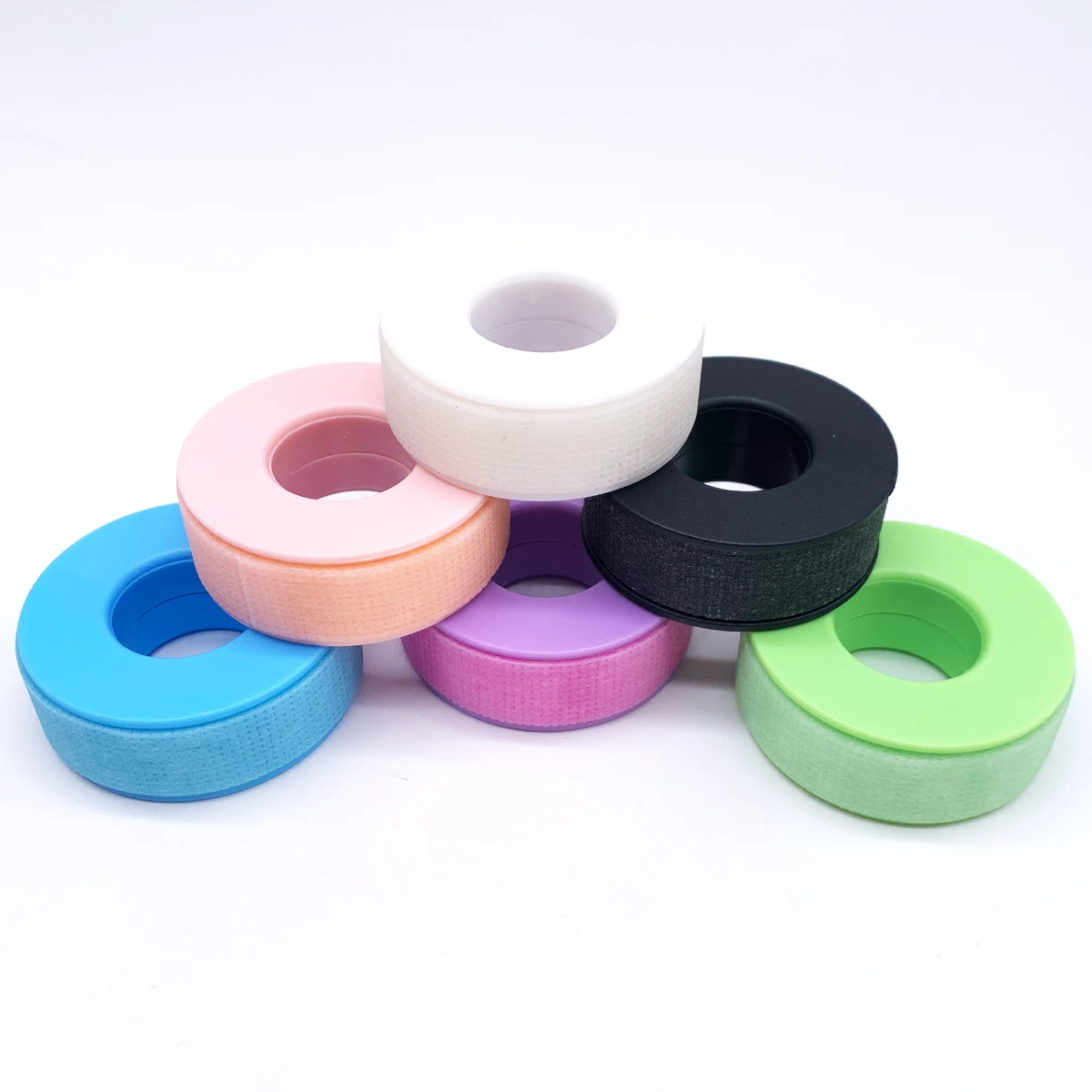 Nicht gewebtes Silikon-Gel-Wimpernband, atmungsaktiv, sensitiv resistent, medizinisches Klebeband in Schwarz, Weiß, Lila für Wimpernverlängerung. – Detail 2