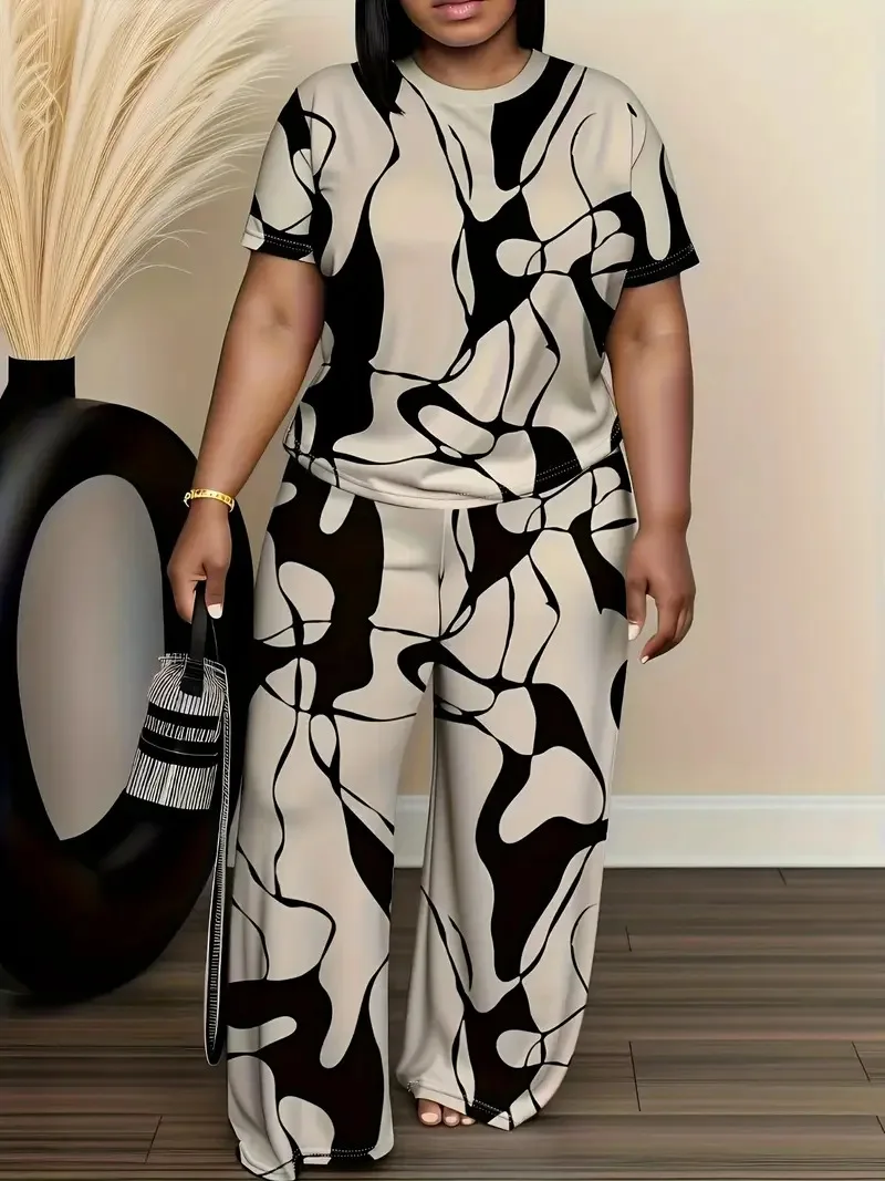 Women's summer fashion print two-piece outfit with round-neck short sleeve T-shirt and wide-leg trousers in a relaxed fit. 985