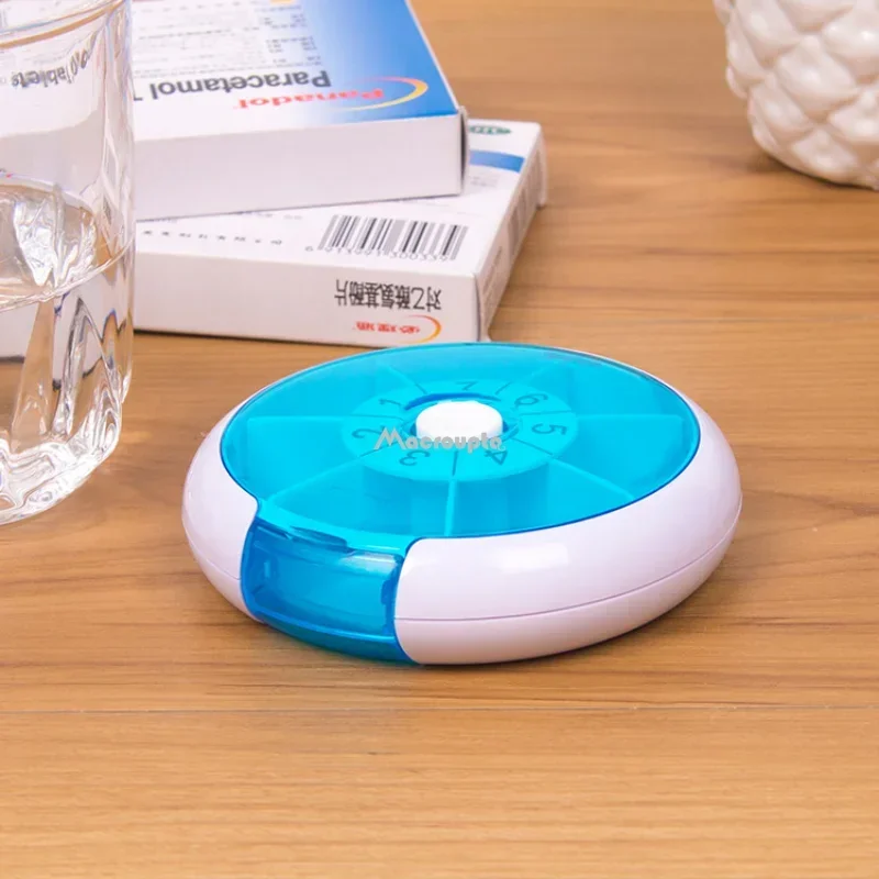 Compact Blue Rotating Pill Organizer - Travel-Friendly Weekly Medicine Case