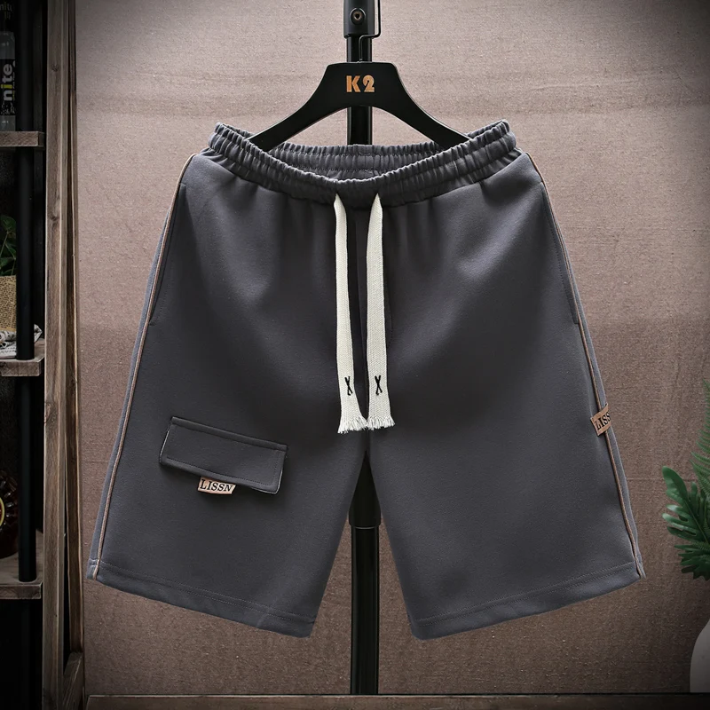 Fashion Elastic Lace Up Spliced Straight Casual Shorts Men's Clothing 2024 Summer Loose High Waist Solid Color Knee Beach Shorts