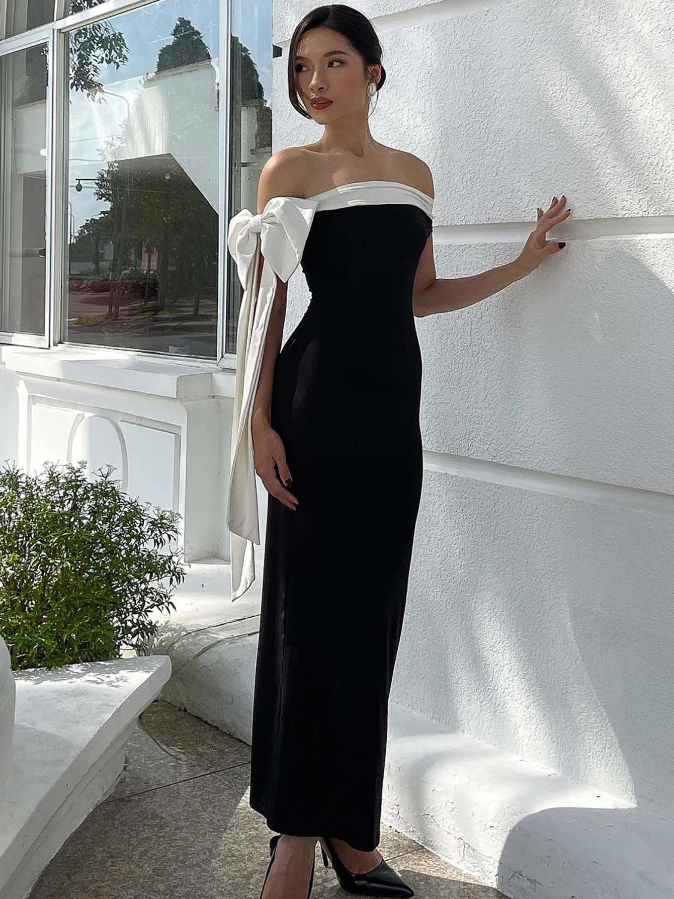 فستان دولزورا طويل بدون أكتاف بدون أكمام مع فيونكة...