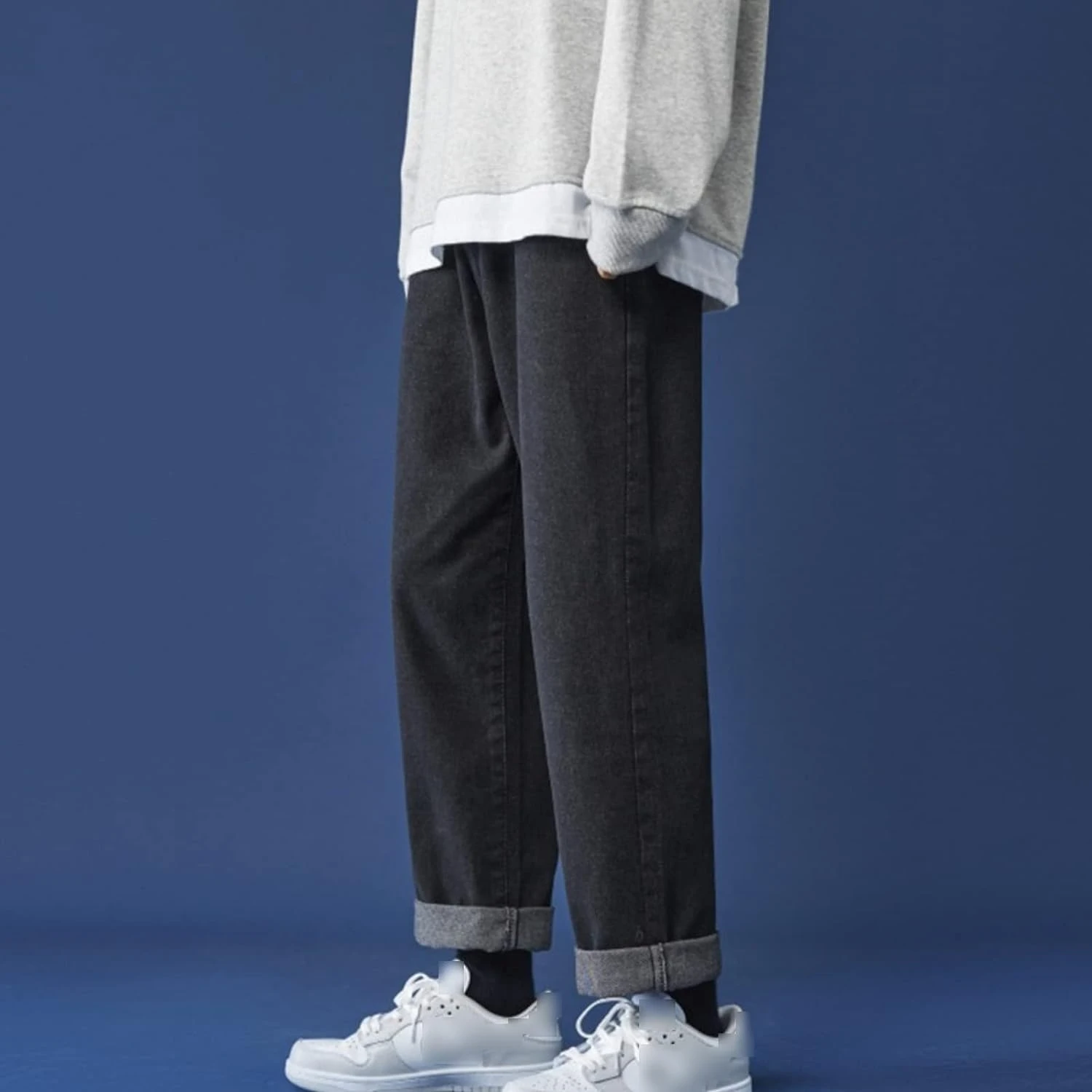 Stylish, comfortable distressed wide leg denim trousers for men effortlessly elevate your look. The relaxed mid-waist fit provid