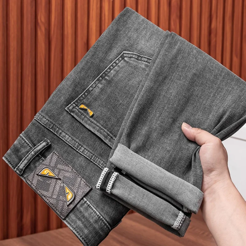 2024 spring and summer new high-end affordable luxury fashion jeans men's stretch denim slim fit tapered casual trousers 4