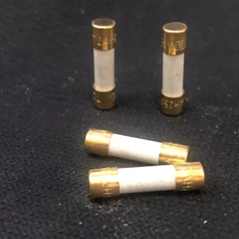 1pcs/lot Original Switzerland SCHURTER Alloy gold-plated audiophile fuse T1A-T16A 5x20mm glass fuse kit