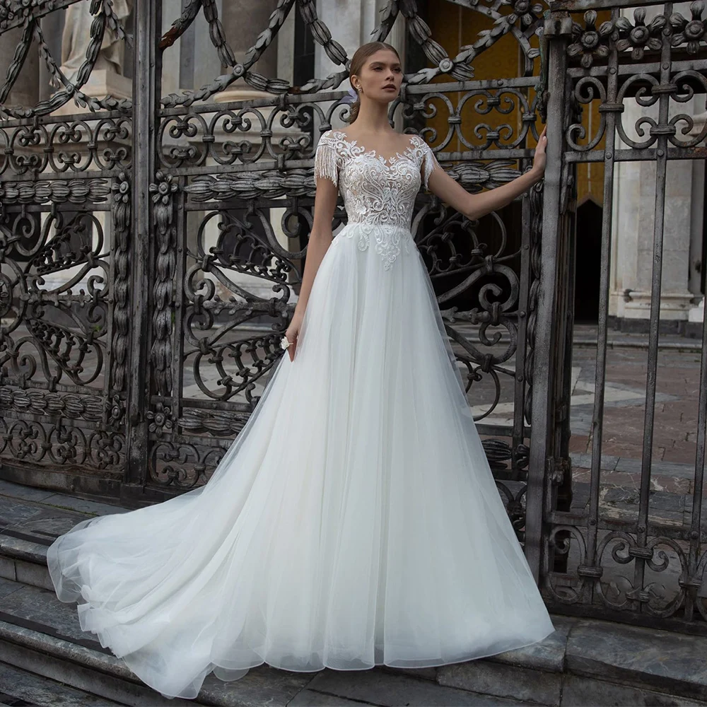 Elegant A-Line Tulle Wedding Dresses 2022  Cap Sleeve Tassel Sheer O-Neck Formal Lace Bridal Gown With Button Back Sweep Train plus size wedding dresses