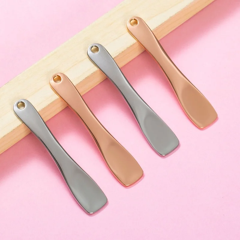 Curved outlet metal spatula