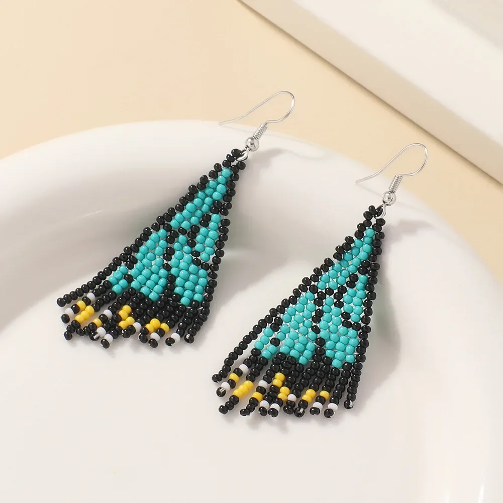 

Rice Bead Earrings Hand weaving Beaded butterfly Simplicity Retro Bohemia geometry alloy ma'am Tassel Earrings