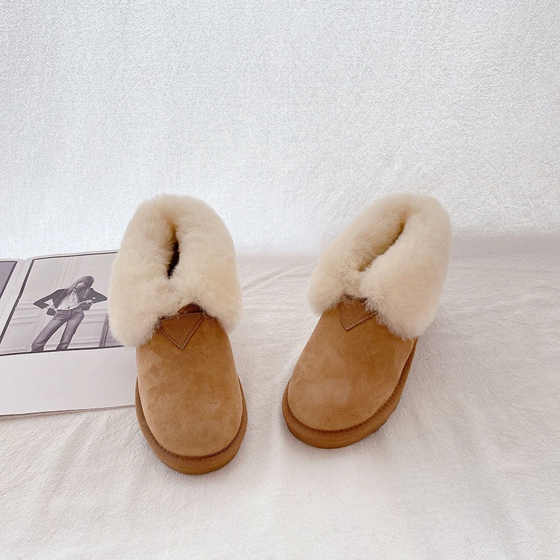 

2023 winter new fur all-in-one snow boots women's leather non-slip warm women's boots fashion outdoor flanging cotton shoes