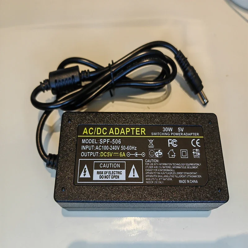 

Original SPF-506 AC/DC Power Adapter AC100-240V 50-60HZ