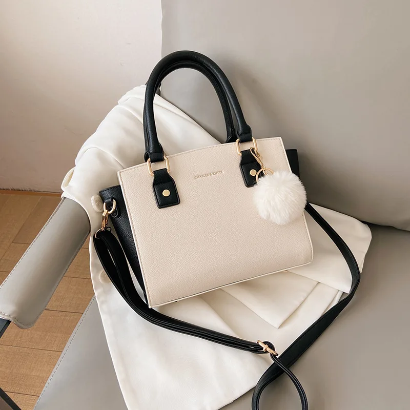 

Europe and the United States new fashion texture hairball women shoulder crossbody handbag