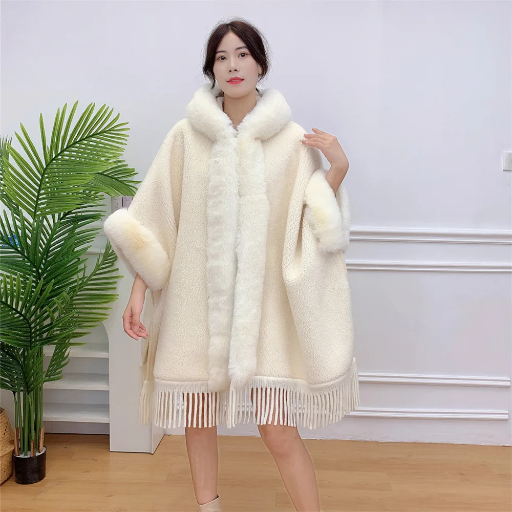 

Winter Artificial Lamb Faux Fur Collar Poncho Cape Tassel Thick Warm Streetwear Women Loose Long Velvet Cloak Coat With Hat