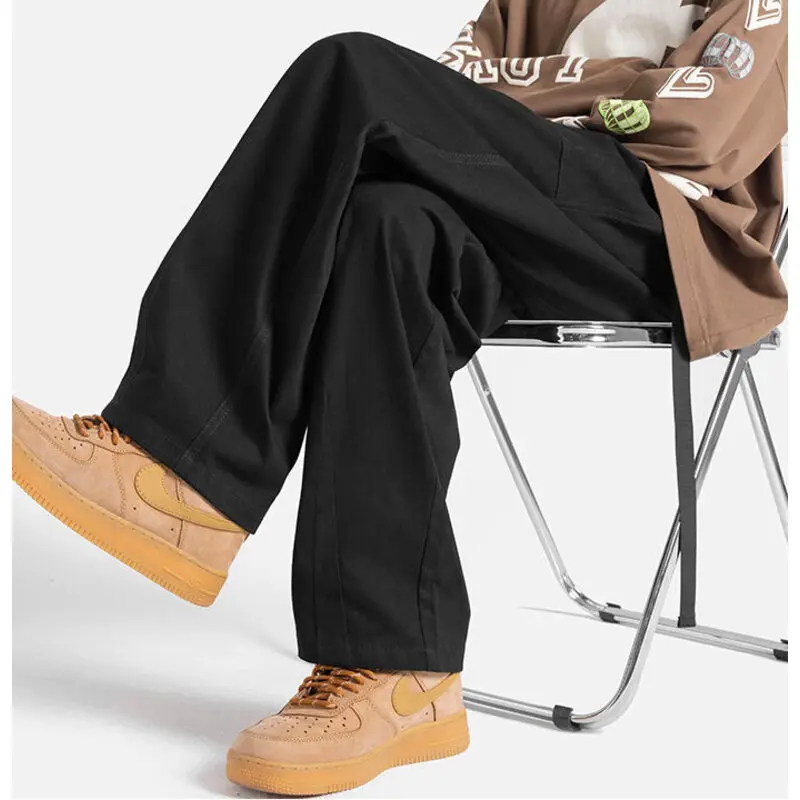 

2023 New Oversize Men Casual Loose Wide Leg Trousers Solid Teen Elastic Belt Straight Tube Trousers Male Hip Hop Streetwear