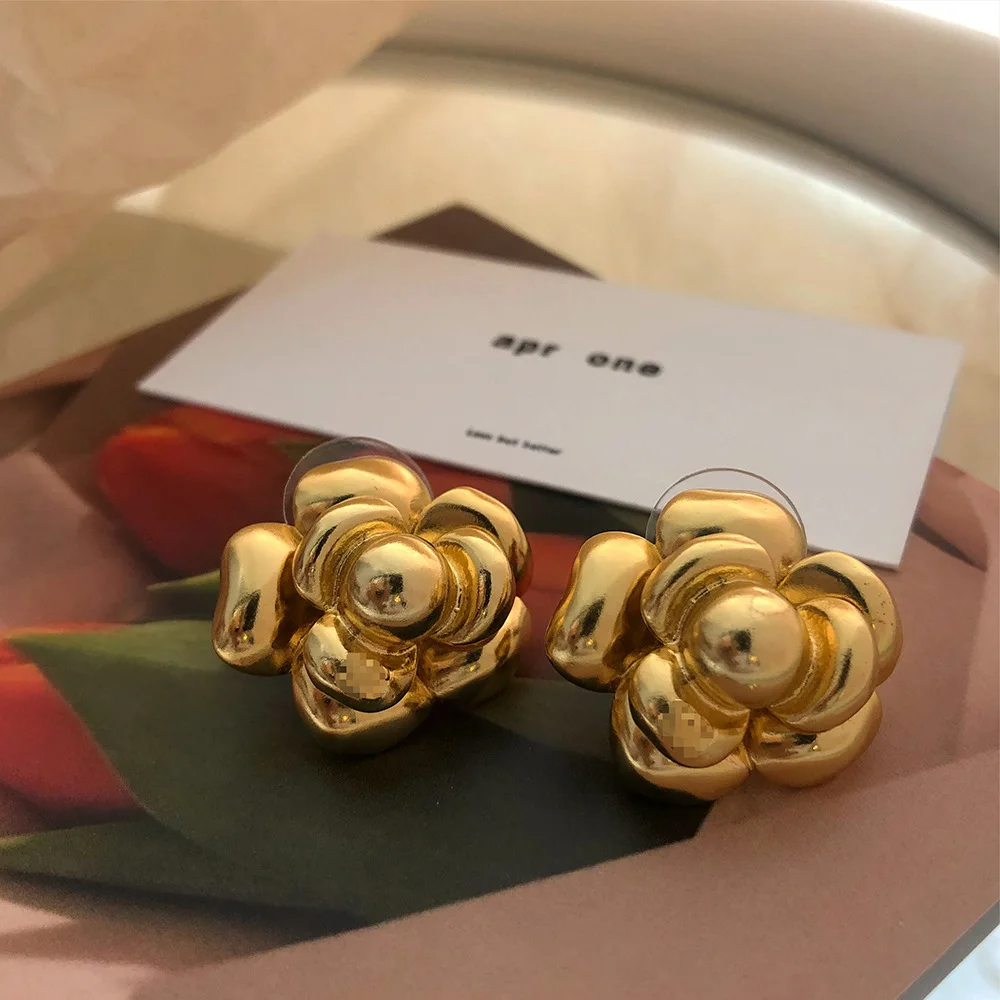 CHANEL VINTAGE Gold Tone Metal Camellia Clip On Earrings