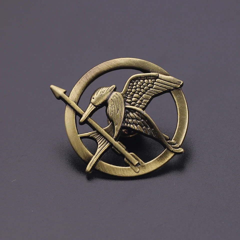 Broches de filme The Hunger Game Mockingjay, emblemas de botão de metal  para bolsa, roupas, alfinetes de lapela, acessórios, brinquedos, presentes  - AliExpress, image size:960x960