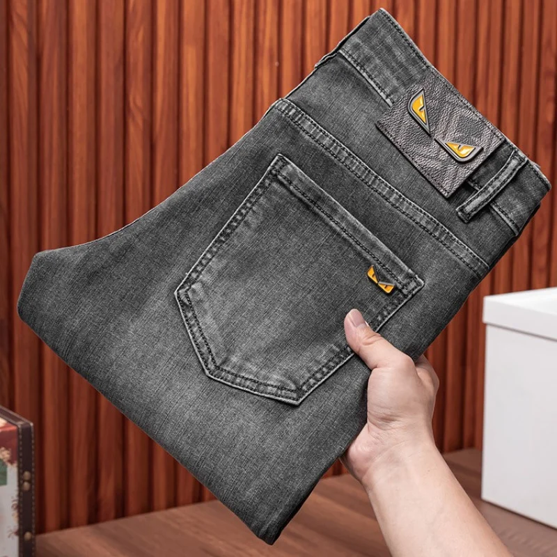 2024 spring and summer new high-end affordable luxury fashion jeans men's stretch denim slim fit tapered casual trousers 3