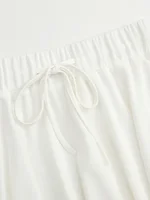GIBSIE Plus Size Preppy Style Pleated Short Skirt Women Summer High Waist Drawstring Solid Waffle Casual A-line Mini Skirts - Image 4