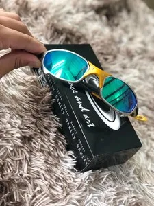 Óculos de Sol Oakley Lente Azul Metal Juliet 24k Lupa Mandrak | Óculos  Feminino Oakley Nunca Usado 56454389 | enjoei