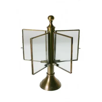 

Frame for 10 photos metal rotatable. Measurements: Ø 19 cm.