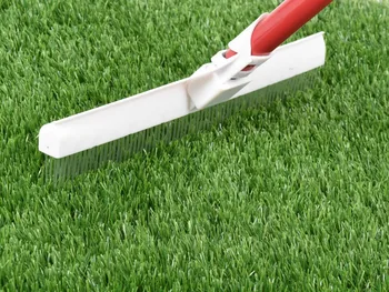 

Brush for artificial grass