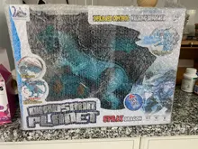 Dino Planet-juguete de dinosaurio que camina con Control remoto, con cabeza móvil, emite humo, emite sonidos de ojos, dragón de hielo con humo