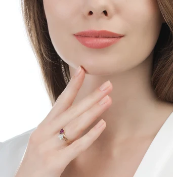 

Gold ring with rubies and diamonds sunlight