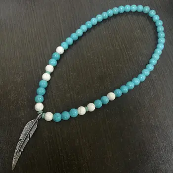 

Beads-choker from turquoise with pendant "feather"