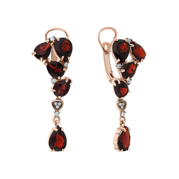 

Silver earrings with cubic zirconia and Garnet sunlight sample 925 test