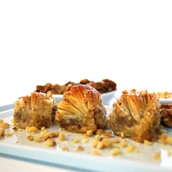

Gulluoglu Mussel Shape Turkish Baklava, Freshly Produced and Long Lasting, Traditional Turkish Baklava, Walnut, 30 Pcs 3.3lb
