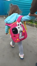 Mochila de grado alto para bebés y niñas, morral escolar 3D antipérdida con dibujos animados para guardería, impermeable de dinosaurios