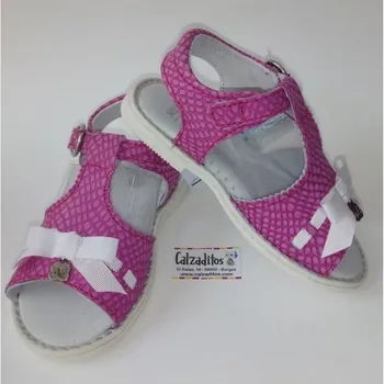 

Leather sandals in finished snake fuchsia with round buckle, Nens