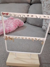 Soporte de exhibición para pendientes de tuerca de Metal con Base de madera, organizador de pendientes con 24/44/66 agujeros, venta al por mayor