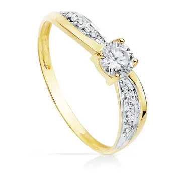 

Solitaire 18k gold two-color cubic zirconia 4mm. Bands [AC0155]