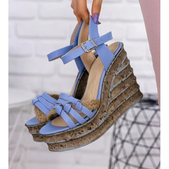 

Avis Bebe Blue Skin Wedges Sandals